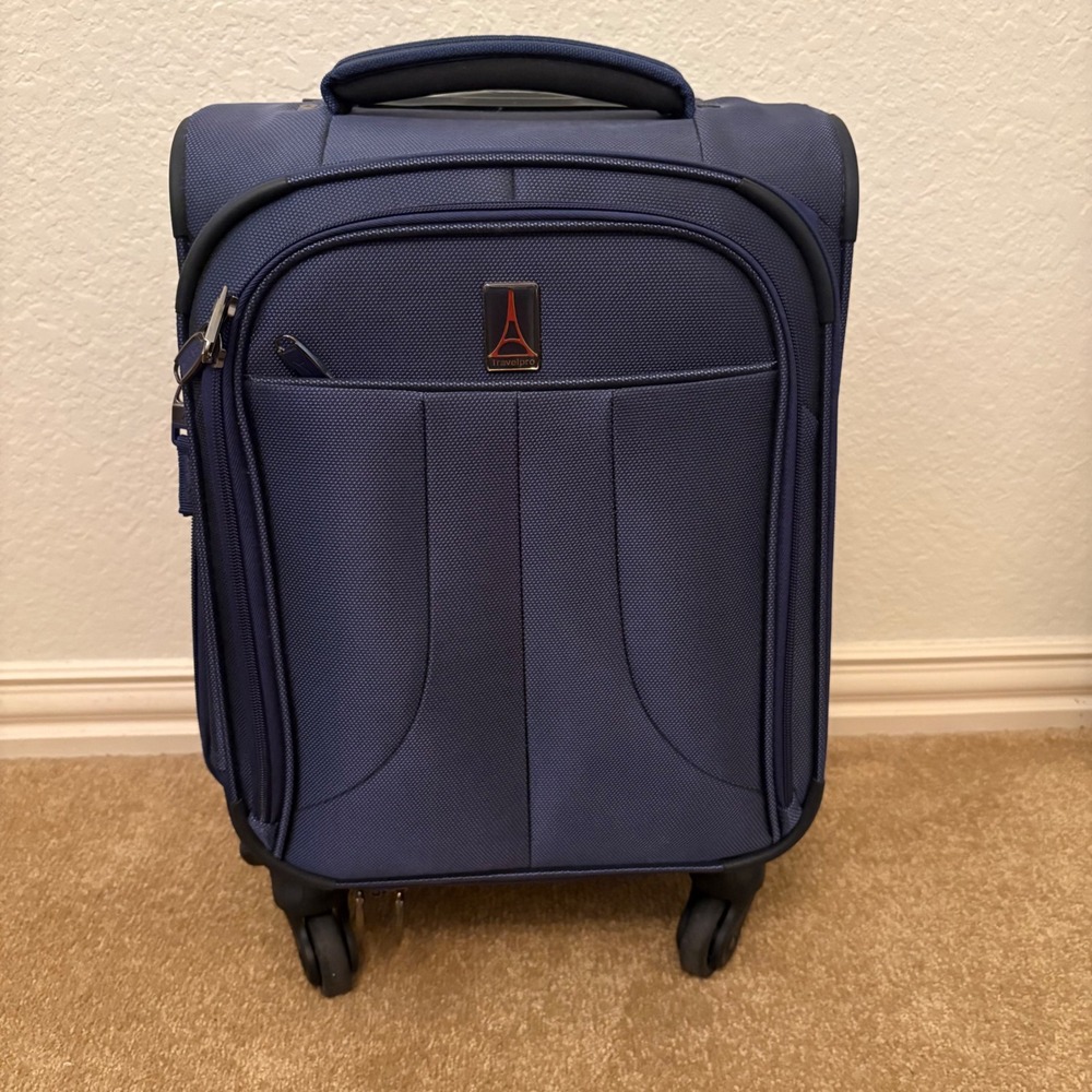 blue Travelpro Tourlite Softside Expandable Luggage travel carry on